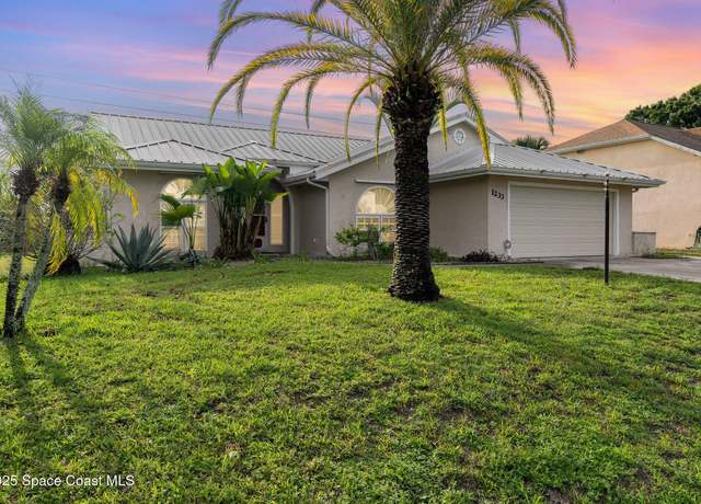 Property at 1233 Lamplighter Dr NW, Palm Bay, FL 32907, 3 beds, 2 baths