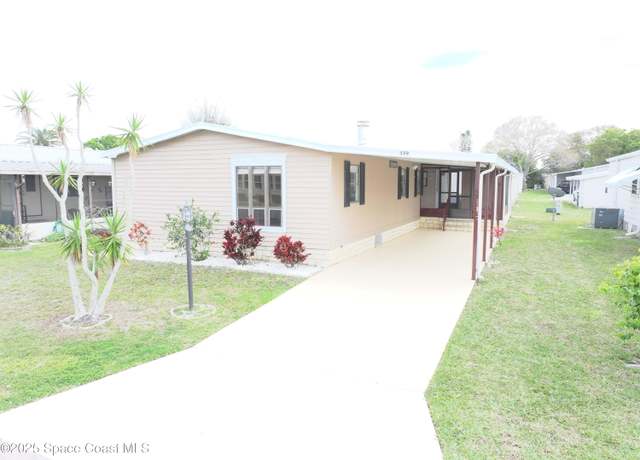 Property at 559 Tarpon Dr, Barefoot Bay, FL 32976, 3 beds, 2 baths