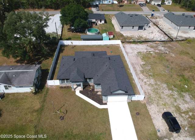 Property at 432 Garvey Rd SW, Palm Bay, FL 32908, 4 beds, 3 baths