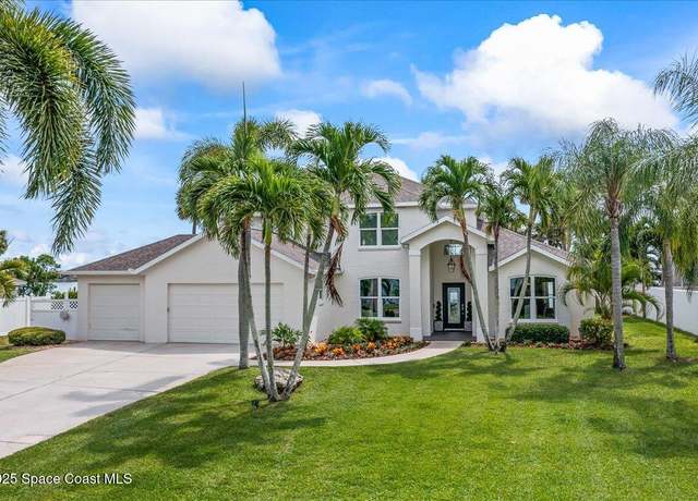 Property at 10710 S Tropical Trl, Merritt Island, FL 32952, 4 beds, 3.5 baths