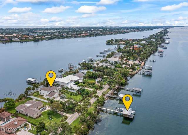 Property at 10710 S Tropical Trl, Merritt Island, FL 32952, 4 beds, 3.5 baths