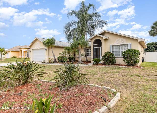 Property at 409 Americana Blvd NE, Palm Bay, FL 32907, 3 beds, 2 baths
