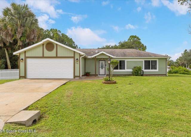 Property at 1384 Serenade St NW, Palm Bay, FL 32907, 3 beds, 2 baths