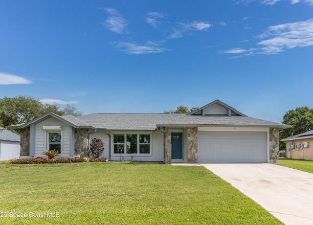 Property at 941 Custer St NW, Palm Bay, FL 32907, 3 beds, 2 baths