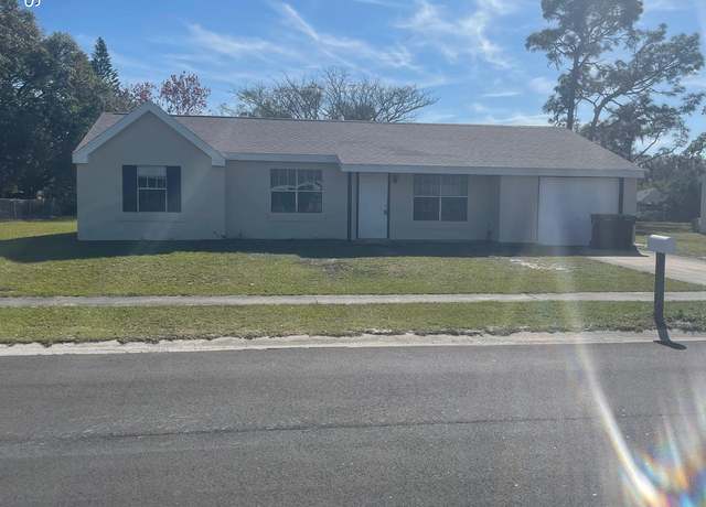 Property at 1048 Newbern St NE, Palm Bay, FL 32905, 3 beds, 2 baths