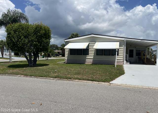 Property at 601 Periwinkle Cir, Barefoot Bay, FL 32976, 2 beds, 2 baths