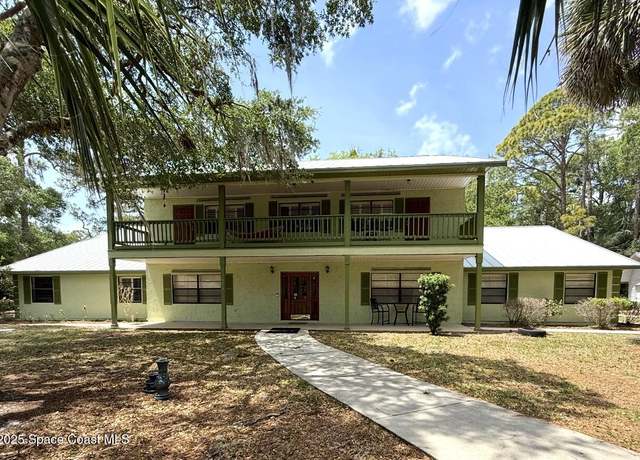 Property at 7370 Turkey Point Dr, Titusville, FL 32780, 5 beds, 4 baths