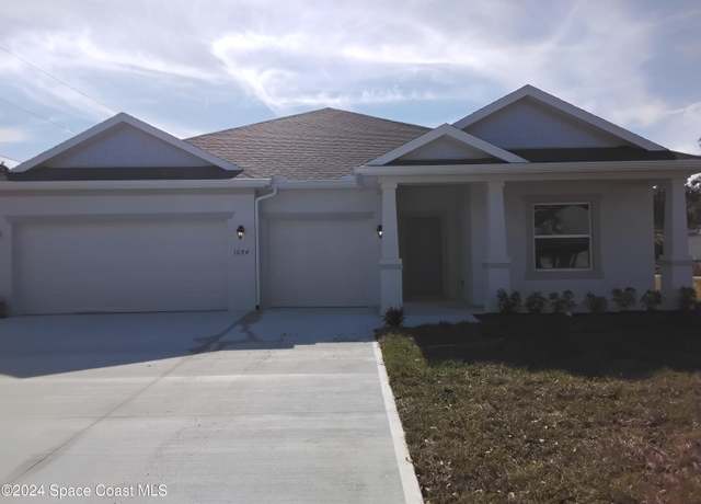 Property at 1694 Heartwellville St NW, Palm Bay, FL 32907, 4 beds, 3 baths