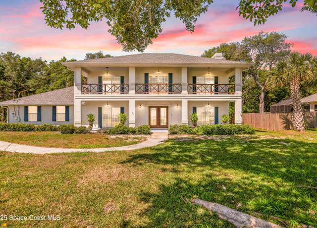 Property at 100 Woods South Dr, Merritt Island, FL 32952, 4 beds, 3.5 baths