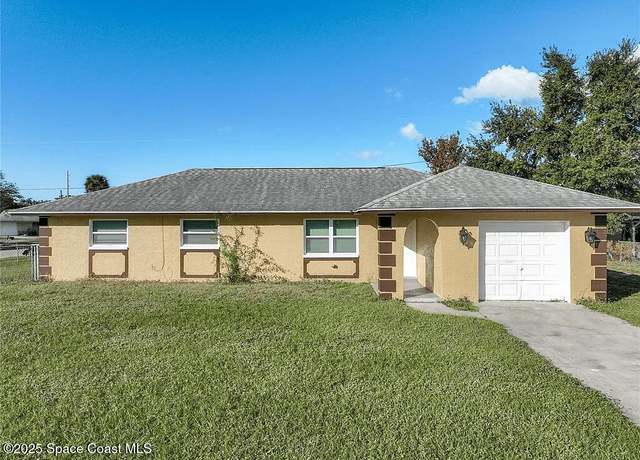 Property at 1140 Dolphin Dr, Rockledge, FL 32955, 4 beds, 2 baths