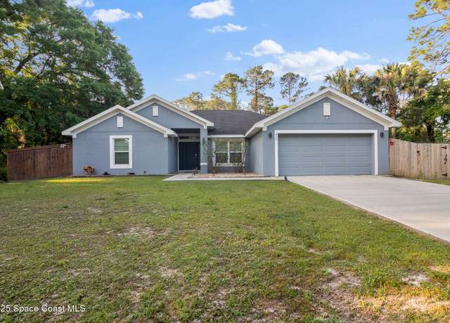Property at 490 Garfield St SW, Palm Bay, FL 32908, 4 beds, 3 baths