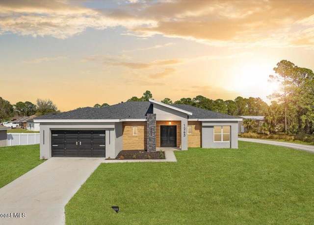 Property at 1265 Biarritz St NW, Palm Bay, FL 32907, 3 beds, 2.5 baths