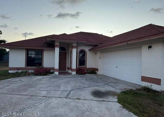Property at 1658 Canon Ave NW, Palm Bay, FL 32907, 3 beds, 3 baths