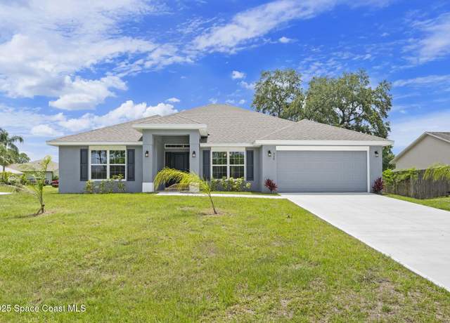 Property at 920 Lyons Cir NW, Palm Bay, FL 32907, 4 beds, 3 baths
