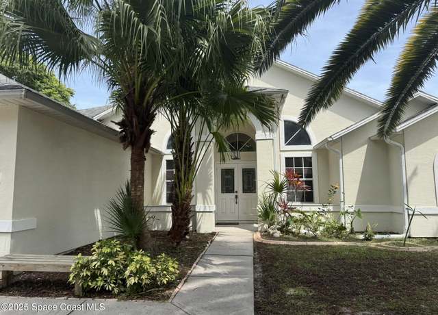 Property at 719 Aachen Ave NW, Palm Bay, FL 32907, 3 beds, 2.5 baths