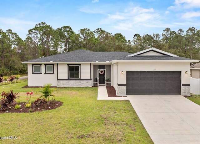 Property at 219 Triana Ave SW, Palm Bay, FL 32908, 4 beds, 2 baths