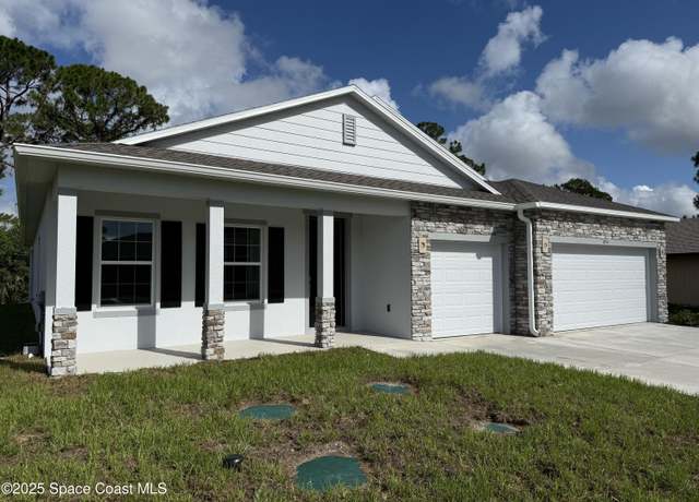 Property at 894 Aachen Ave NW, Palm Bay, FL 32907, 4 beds, 3 baths