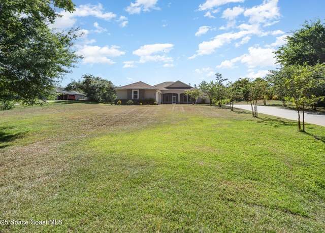 Property at 1560 Silk Oak Ave, Titusville, FL 32796, 4 beds, 3 baths