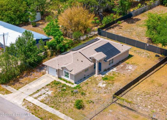 Property at 1400 Ziruth Ave, Titusville, FL 32780, 4 beds, 2 baths