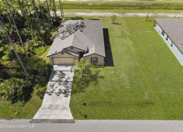 Property at 302 Olin Rd SW, Palm Bay, FL 32908, 5 beds, 3 baths