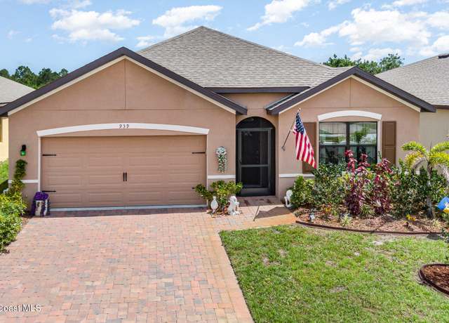 Property at 939 Remington Green Dr SE, Palm Bay, FL 32909, 4 beds, 2 baths