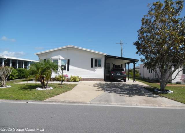 Property at 748 Gladiolus Dr, Barefoot Bay, FL 32976, 2 beds, 2 baths