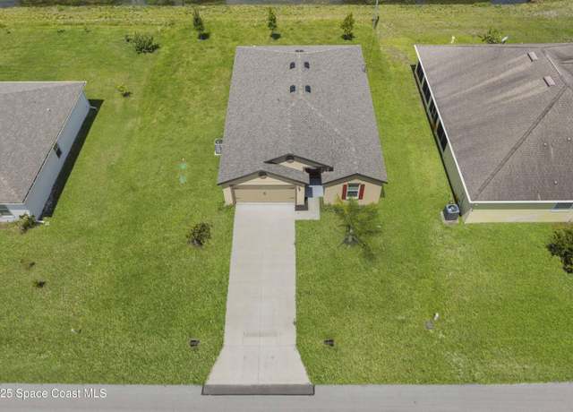 Property at 2120 Garbett Ave SW, Palm Bay, FL 32908, 5 beds, 3 baths