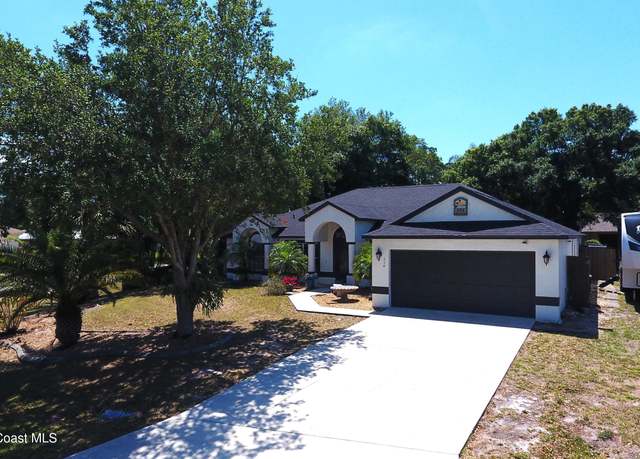 Property at 254 Olivick Cir NE, Palm Bay, FL 32907, 4 beds, 2 baths