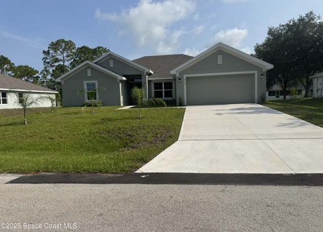 Property at 939 Ais St SW, Palm Bay, FL 32908, 4 beds, 3 baths