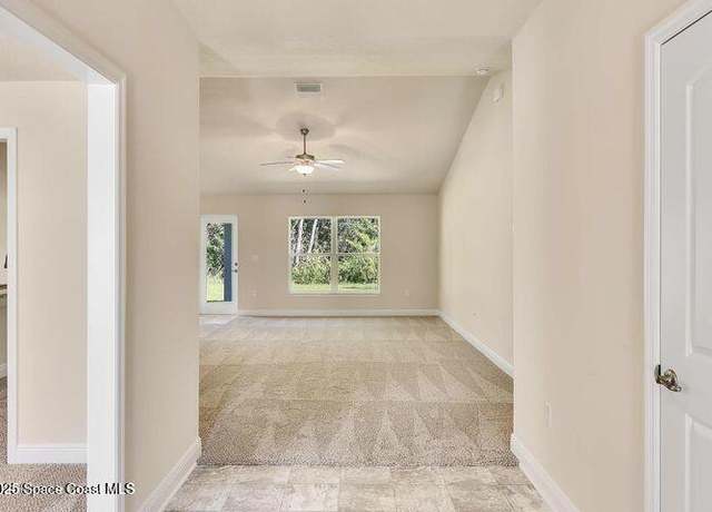 Property at 1581 San Filippo Dr SE, Palm Bay, FL 32909, 4 beds, 3 baths