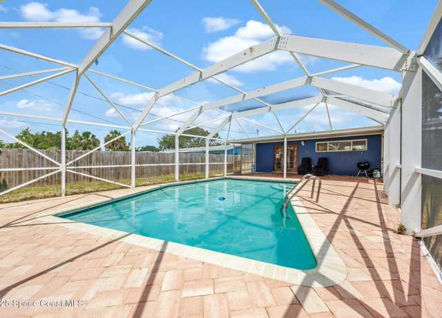 Property at 1109 Pinetree Dr, Indian Harbour Beach, FL 32937, 3 beds, 2 baths