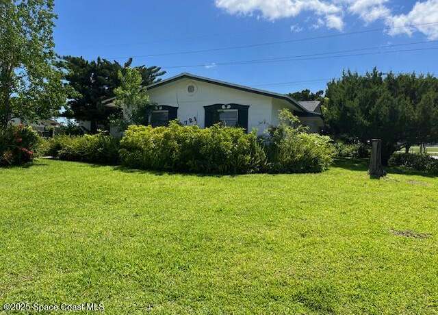 Property at 721 Fern Ave, Titusville, FL 32796, 4 beds, 2 baths