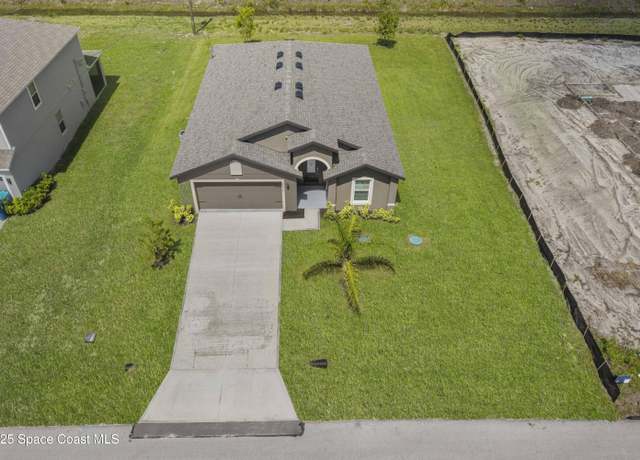 Property at 2270 Harbison Ave SW, Palm Bay, FL 32908, 4 beds, 2 baths