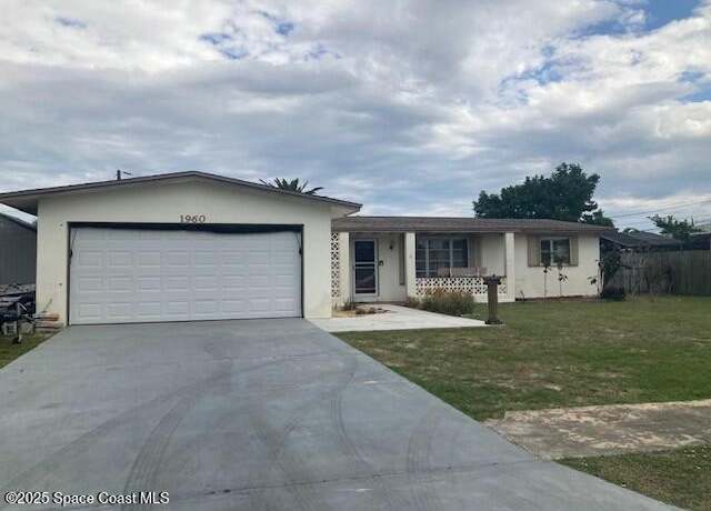 Property at 1960 W Phillips Ct, Merritt Island, FL 32952, 3 beds, 2 baths