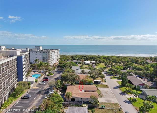 Property at 119 Surf Dr, Cocoa Beach, FL 32931, 7 beds, 4 baths