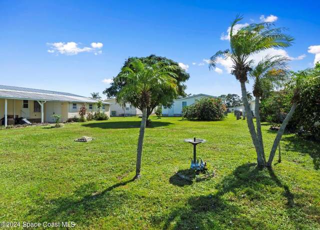 Property at 335 Loquat Dr, Barefoot Bay, FL 32976