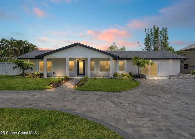 Property at 10900 S Tropical Trl, Merritt Island, FL 32952, 4 beds, 3 baths