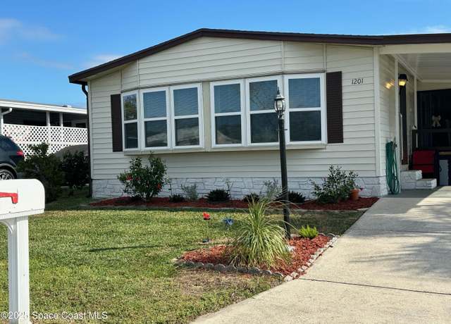 Property at 1201 Areca Dr, Barefoot Bay, FL 32976, 2 beds, 2 baths