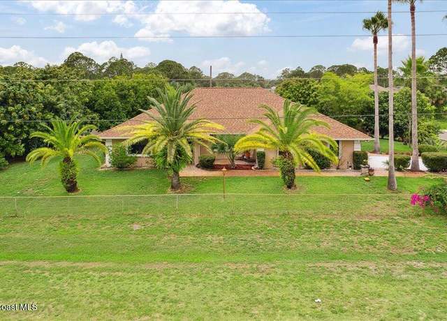 Property at 1510 Jupiter Blvd NW, Palm Bay, FL 32907, 4 beds, 2 baths