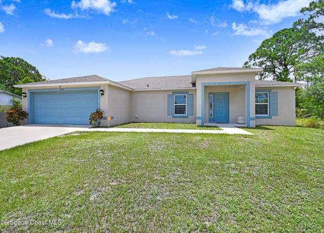 Property at 870 Buchanan Ave SE, Palm Bay, FL 32909, 4 beds, 2 baths