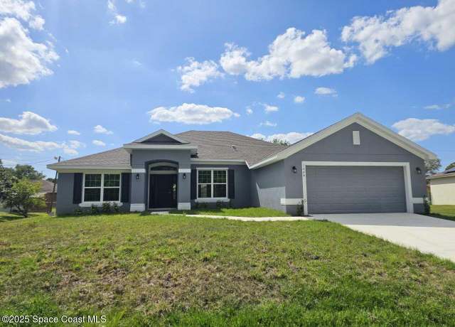 Property at 1004 Early Dr NW, Palm Bay, FL 32907, 4 beds, 3 baths