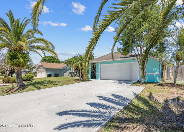 Property at 619 Dinner St NE, Palm Bay, FL 32907, 5 beds, 2.5 baths