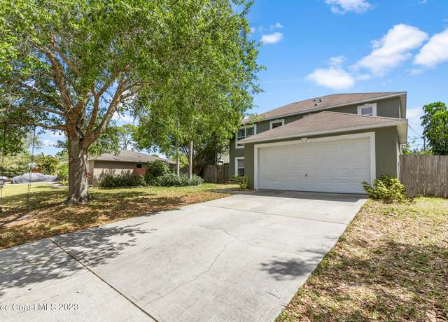 Property at 753 Isle Royale Ave NW, Palm Bay, FL 32907, 6 beds, 2.5 baths
