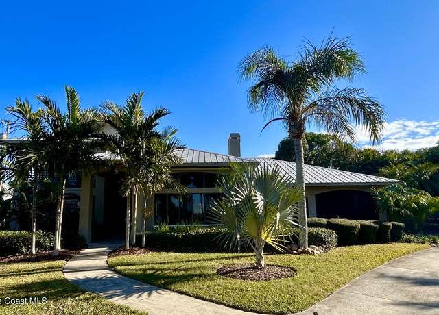 Property at 10910 S Tropical Trl, Merritt Island, FL 32952, 3 beds, 3.5 baths