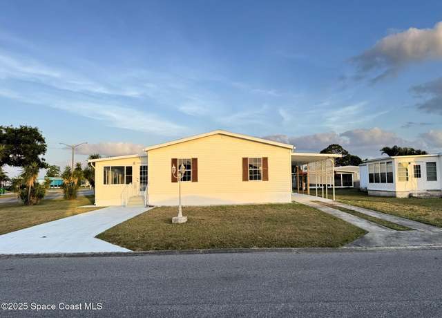 Property at 1001 Waterway Dr, Barefoot Bay, FL 32976, 3 beds, 2 baths