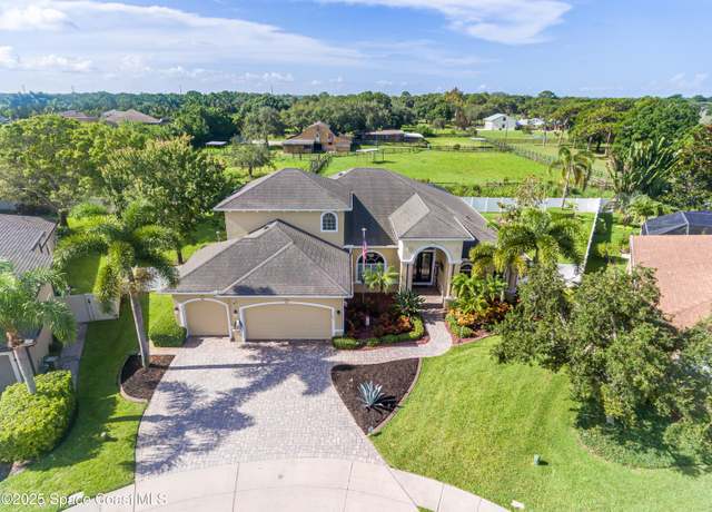 Property at 1564 Bonelli Ct, Melbourne, FL 32934, 4 beds, 3.5 baths