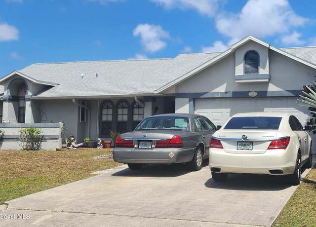 Property at 1381 Mann Ave NW, Palm Bay, FL 32907, 3 beds, 2 baths