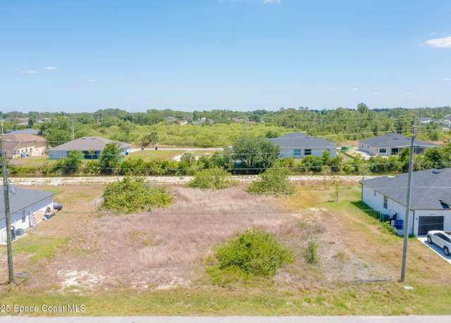 Property at 2405/2407 Ansel Ave S, Lehigh Acres, FL 33973
