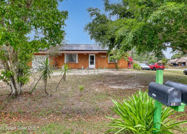 Property at 905 Spring St NW, Palm Bay, FL 32907, 3 beds, 3 baths
