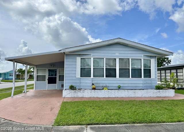 Property at 2318 Coconut Palm Dr NE, Palm Bay, FL 32905, 2 beds, 2 baths
